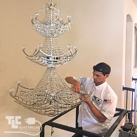 Electrician assembles and installs Chandelier for you.